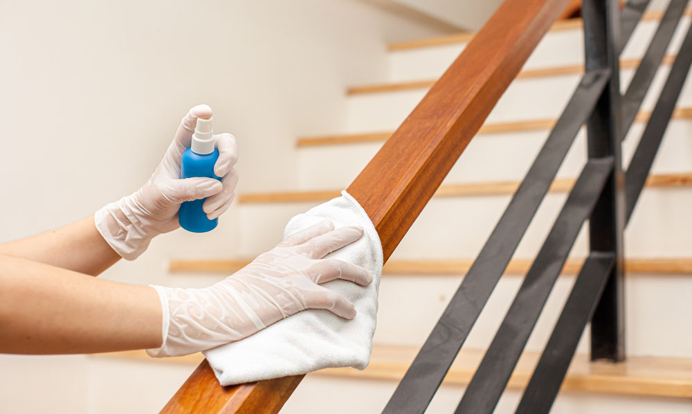 professional office cleaner | disinfecting hand rail