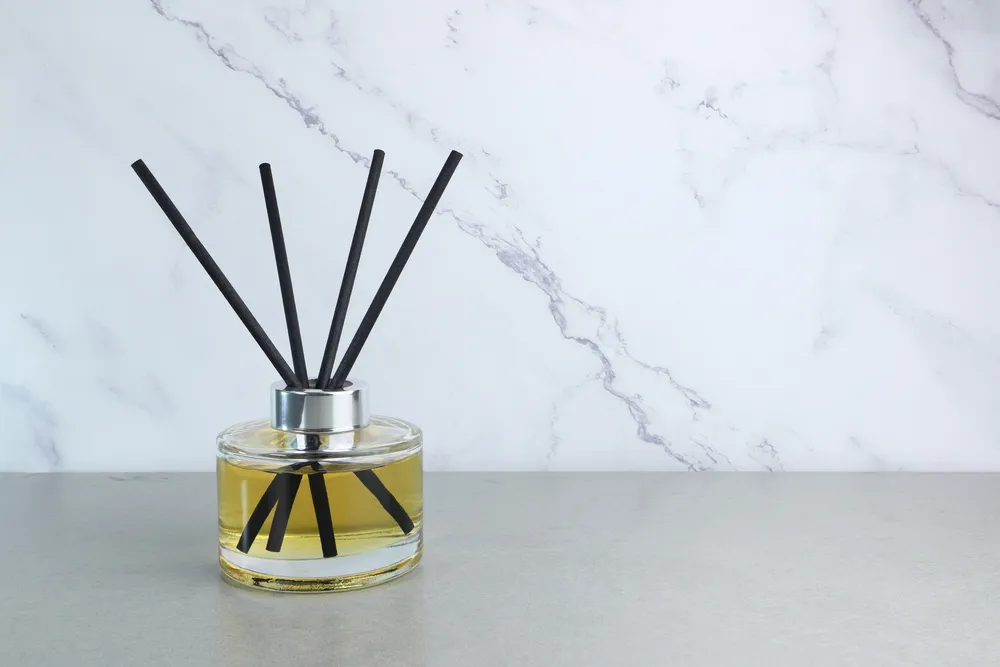 Smelly office | Reed diffuser on desk