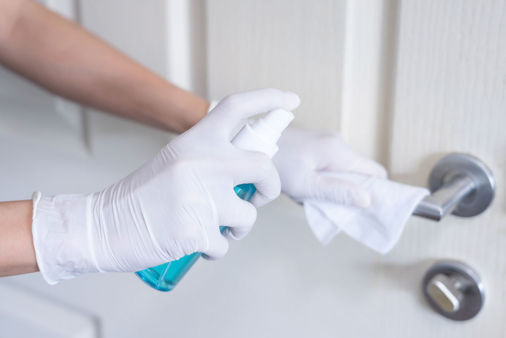 How to Deep Clean Your Office | sanitising door handle