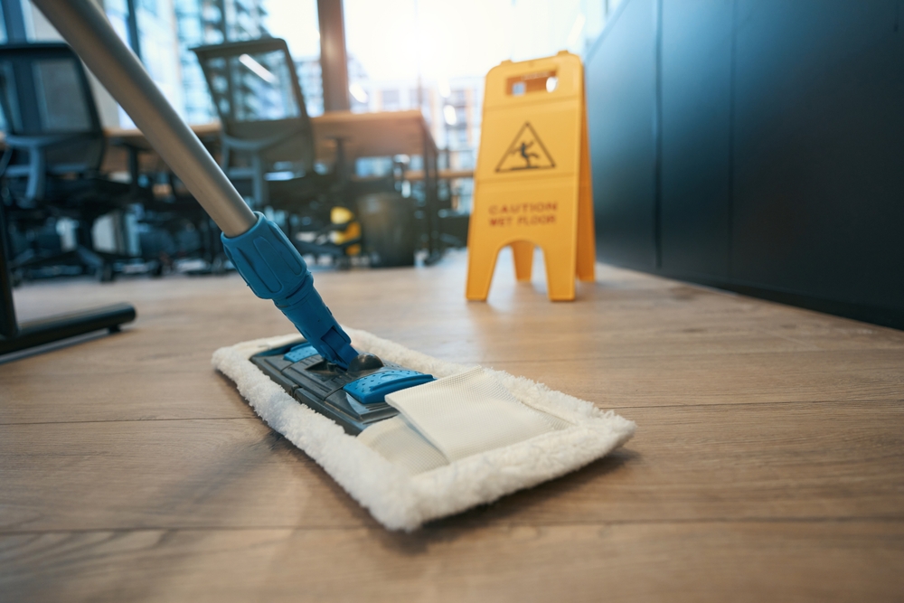 What Is Commercial Cleaning | mop cleaning a floor